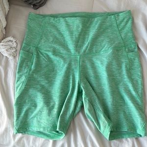 Green biker shorts